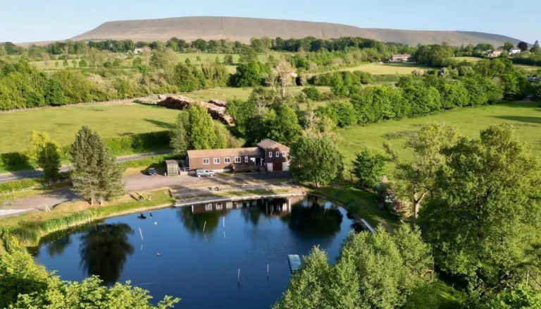 Clitheroe Canoe Club Lake with Pendle Hill